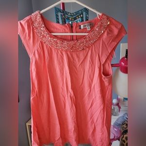 Medium coral Jennifer Lopez top with beads & sequins.